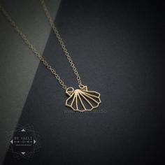 "Gold shell necklace, simple and perfect for everyday necklace. makes for the perfect gift for scuba divers, snorkelers, and those who are fascinated by the sea creatures. ★This is the gold item, for the silver item use this link: https://www.etsy.com/listing/595521436 ♥WANT TO MAKE IT PERSONAL? ♥ Add a charm letter to your necklace - Add this item: https://www.etsy.com/il-en/listing/687931684 ★ Comes in our signature box, ready for gift giving. ★ Available in Gold [18K goldfield & gold plat Minimalist Gold Shell Necklace As Gift, Gold Seashell Necklace, Gold Compass Necklace, Jewelry Design Studio, Sea Necklace, Whale Necklace, Ocean Necklace, Sea Jewelry, Compass Pendant