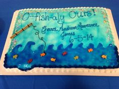 a sheet cake decorated with an ocean theme and the words o - fishy cuts