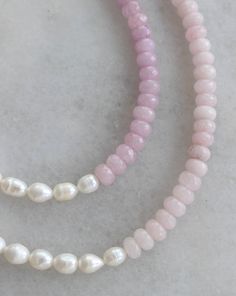 All things sweet & pearl! Choose from two gorgeous hues of pink and purple jade beads, split with real, freshwater pearls. Adjustable 15-17in. Finished off with 14K gold filled materials. Nickel and lead free. Pink Pearl Jewelry With Natural Stones, Pink Pearl Beaded Necklaces With Gemstone Beads, Pink Pearl Jewelry With Gemstone Beads, Pink Pearl Necklace With Gemstone Beads, Handmade Pink Pearl Necklace, Pink Pearl Chain Beaded Necklaces With Round Beads, Pink Pearl Chain Beaded Necklace With Round Beads, Pink Pearl Chain Necklace With Round Beads, Pink Dainty Pearl Chain Necklace