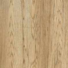 a close up view of the wood grains on this flooring project, with light brown