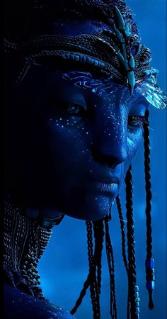 a woman with blue face paint and braids on her head, in the dark