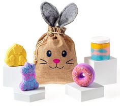 an assortment of toys including doughnuts and bunny ears