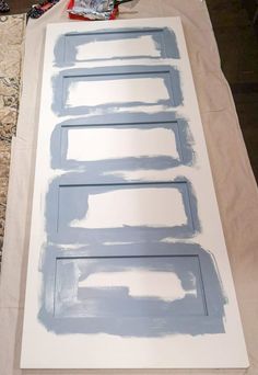 some paint is being applied to the door frame for this diy wall art project