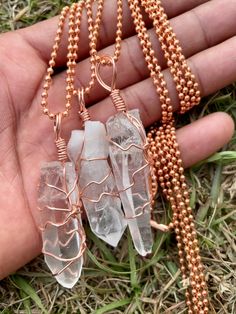 "LEMURIAN SEED CRYSTAL: Connection with the Divine Feminine/ Goddess energy / Great Mother; connecting with ancient Earth knowledge, especially from Lemuria; Angelic & higher self connection; Heart-centered wisdom; Soothing & nurturing energy. Element: Air (Wind), Earth; Chakras: Crown, Soul Star, & Etheric Lumarian seed Quartz crystal with NEW IDEAS * SERENITY * WISDOM A magical stone with an epic lineage, the Lemurian Quartz crystal is a treasure trove of wisdom. Like the rings of a tree trunk Handmade Spiritual Copper Crystal Necklace, Handmade Copper Crystal Necklaces For Spiritual Use, Earth Chakras, Self Connection, Chakras Crown, Healing Message, Divine Feminine Goddess, Element Air, Sage Smudging