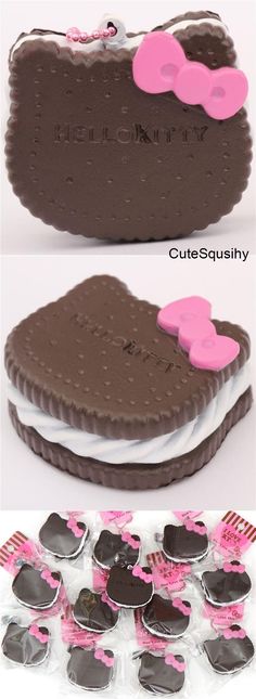 the chocolate cake is decorated with pink bows and hearts on it's side, while other cookies are in the background