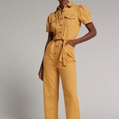 Euc Like New Anthropologie Marigold Denim Jumpsuit By: Boyish 70% Organic Cotton, 30% Tencel Relaxed Fit Front Button Flap Pockets; Side Slant And Back Patch Pockets Removable Belt Button Front Machine Wash Imported Dimensions 55"L 27" Inseam 15.5" Leg Opening Yellow Fitted Jumpsuits And Rompers With Pockets, Fitted Yellow Jumpsuits And Rompers With Pockets, Yellow Spring Overalls With Pockets, Spring Yellow Overalls With Pockets, Spring Yellow Jumpsuits And Rompers With Pockets, Casual Yellow Jumpsuits And Rompers For Work, Spring Yellow Cotton Jumpsuits And Rompers, Yellow Cotton Jumpsuits And Rompers For Spring, Yellow Cotton Overall Jumpsuits And Rompers