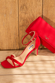 Step into summer wedding elegance with this stunning red heeled sandal and clutch bag set. Perfect for any wedding guest, this matching duo adds a touch of sophistication and vibrant style to your ensemble. Whether dancing the night away or mingling with friends, these eye-catching accessories are a must-have for your summer celebration. Embrace the festive spirit and elevate your wedding wardrobe with this chic and coordinated look! Red Clutch Bag, Red Clutch, Summer Celebration, Bag Set, Summer Wedding