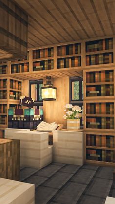 a room filled with lots of books and furniture