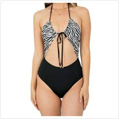 One-Piece Swimsuit With A Geometric Front Cut-Out And Plunging Open Back. U-Neck Sleeveless Front Cut-Out Open Back 85% Polyester/15% Spandex Fitted Zebra Print Swimwear For Summer, Fitted Zebra Print Triangle Top Swimwear, Summer Swimwear With Zebra Print, Black Fitted Swimwear With Zebra Print, Fitted Zebra Print Swimwear For Swimming, Fitted Zebra Print Swimwear For Vacation, Summer Beachwear With Zebra Print, Fitted Black Zebra Print Swimwear, Summer Zebra Print Beachwear