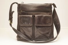 Light wear.  Good quality leather. About 10.5" tall, 10" wide, 4.25" deep. (office use - u5) Classic Brown Shoulder Bag With Pockets, Classic Satchel Shoulder Bag With Pockets, Elegant Leather Shoulder Bag With Pockets, Casual Rectangular Shoulder Bag With Leather Lining, Casual Leather-backed Satchel Shoulder Bag, Casual Business Satchel With Pockets, Leather Satchel With Pockets For Fall, Classic Shoulder Bag With Flap And Pockets, Classic Flap Shoulder Bag With Pockets