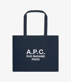 - Unisex model. - Two large handles to carry the bag by hand or on the shoulder. - One interior pocket. - 'A.P.C. Rue Madame Paris' logo embroidered on the front. - 100% recycled polyester. Paris Logo, Recycled Canvas, Dark Navy Blue, Logo Embroidered, Dark Navy, A P, Recycling, Handles, Navy Blue