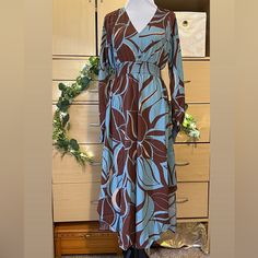 Beautiful Wrap Dress With A Beautiful Tropical Floral Design. Brand New. Flowy Long Sleeve Brown Midi Dress, Brown Flowy Long Sleeve Midi Dress, Flowy Brown Midi Dress For Vacation, Tropical Dress, Dresses Floral, Source Unknown, Tropical Floral, Blue Brown, Wrap Dress