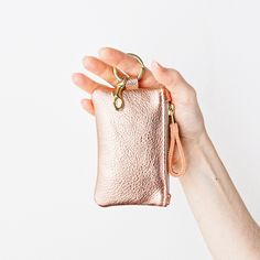 "This super cute keychain zip wallet is created with your choice of 4 super supple metallic leather colors (rose gold, platinum, silver, or gold). It will hold your credit cards, receipts, cash, change and lip balm in a convenient little package. It's great for those quick trips to the grocery store. It also makes a great little gift for that special someone. D E T A I L S: * 100% cowhide leather. * Wallet Dimensions: Width 5\" / Height 3.25\" * Keyring with Swivel Snap Dimensions: Length 2.75\" Pouch Keychain, Leather Zip Pouch, Leather Credit Card Wallet, Leather Colors, Cards Business, Keychain Wallet, Credit Card Wallet, Cute Keychain, Change Purse