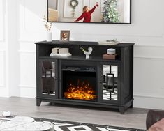 a living room with a fire place in the center and a mirror on the wall