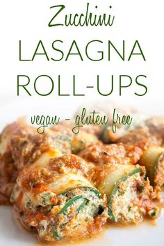 zucchini lasagna roll - ups on a plate with text overlay