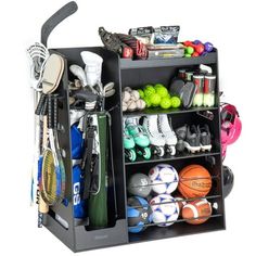 Declutter the garage and keep sports equipment and accessories looking neat! The GoSports Wooden Sports Equipment Organizer is a modern space-saving solution for neatly storing all the equipment that comes from having a sports family. The storage rack is great for golf, baseball, soccer, basketball, tennis, kids sports & toys and more! The premium build features a sturdy wood construction and is painted black for a clean look that complements your home. Don't settle for flimsy metal wire storage racks! Upgrade with multiple heavy-duty storage compartments: 1 main bin for large items, 3 shelves, ball bin, bat rack, and 8 hooks. The organizer includes illustrated step-by-step instructions for easy assembly; assembled size measures 44 L x 20 W x 47 H inches. The main bin measures 12 L x 20 W Baseball Storage Ideas, Sport Equipment Storage Ideas, Golf Bag Storage Diy, Sports Equipment Organization, Exercise Space, Sports Equipment Storage, Garage Clutter, Sport Rack, Bag Rack