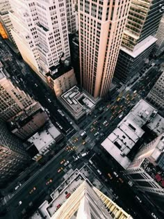 an aerial view of the city with tall buildings