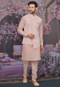 Readymade Art Silk Kurta in Peach This Collar Neck and Full Sleeve attire is Allured with Buttons and Thread Work Available with a Peach Art Silk Aligarhi Pant and a Peach Satin Asymmetric Nehru Jacket Do note: Footwear shown in the image is for presentation purposes only. Half to one inch may vary in measurement. (Slight variation in actual color vs. image is possible) Kurta Pajama With Jacket, Engagement Dress For Groom, Peach Saree, Designer Kurta, Kurta Men, Latest Bridal Dresses, Men's Ethnic Wear, Indian Men Fashion