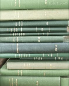 a stack of books sitting on top of each other