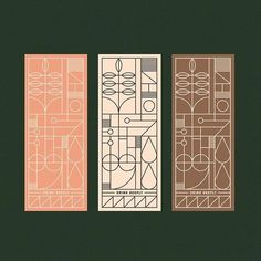 three bookmarks with abstract designs on them