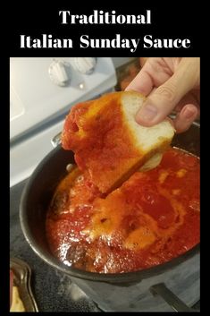 someone is dipping some bread into a pot of tomato sauce with the words traditional italian sunday sauce above it