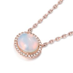 Moonstone, with its ethereal shimmer and captivating play-of-color. The sparkling rainbow moonstone set in the oval bezel sparkles in the light. Grad this perfect chance and speak up your love to someone you cherish with this romantic and beautiful necklace! Wherever she goes, this necklace is a sweet reminder of your love.Carat Weight: 2.075 ctStone Size: 7*9 mmStone Type: Jeulia® StoneNumber of Stones: 1 Stone Color: MoonstoneStone Shape: OvalCarat Weight: 0.28 ctStone Size: 1 mmNumber of Ston Elegant Moonstone Oval Pendant Jewelry, Oval Moonstone Necklace For Anniversary, Oval Moonstone Cabochon Necklace, Moonstone Stone, Round Necklace, Classic Necklace, Moonstone Necklace, Necklace Online, Beautiful Necklace