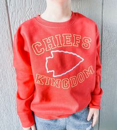 Kansas city chiefs, chiefs football adult crew neck sweatshirt red crew neck sweatshirt with yellow, white lettering long lasting heat pressed vinyl print design perfect for game day in the KCMO wash on cold and dry on low, or hang to dry unisex sizing soft blend polyester/cotton sweatshirt available sizes: s-3xl Red Sweatshirt For Fan Merchandise, Fall Season, Red Sweatshirt For Fan Merchandise In Fall, Red Sweatshirt For Fall Fan Merchandise, Red Sweatshirt For Sports Season Fan Merchandise, Red Sweatshirt For Sports Fan Merchandise, Red Sweatshirt With Ribbed Cuffs For Game Day, Red Team Spirit Sweatshirt For Game Day, Red Sweatshirt For Game Day With Team Spirit, Red Pre-shrunk Sweatshirt With School Spirit