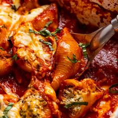 a close up of a plate of food with meat and sauce