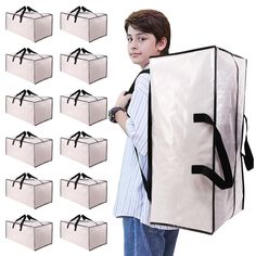 a boy is holding a large bag in front of many smaller bags with black straps