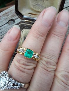 Beautiful 18k Yellow Gold, Approximately 1ct Cushion Cut Colombian Emerald, Diamond Baguette ring.. all sales are final. Weight is 5.5 Grams. Size 7 3/4.. Very Good Pre Owned Vintage Condition.. Ring Guard is NOT INCLUDED, just to show some ideas.. some pics ENLARGED to see details. Antique Box for Display only. Elegant Emerald Ring With Baguette Diamonds, Elegant Emerald Ring With Baguette Diamonds For Formal Occasions, Exquisite Emerald Baguette Cut Diamond Ring, Elegant Emerald Ring With Baguette Diamonds And Asscher Cut, Elegant Emerald Ring In Yellow Gold With Baguette Diamonds, Elegant Emerald Ring With Baguette Diamonds In Yellow Gold, Elegant Yellow Gold Emerald Ring With Baguette Diamonds, Timeless Baguette Cut Emerald Ring For Anniversary, Elegant Asscher Cut Emerald Ring With Baguette Diamonds