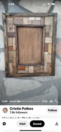 a photo frame made out of wooden blocks on a stone wall with the words crissn poles 70k followers below it