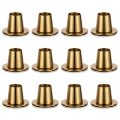 set of twelve brass plated cups on white background