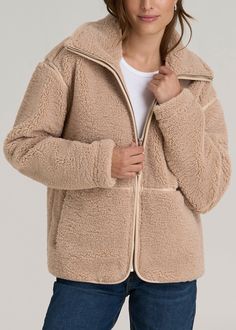 The Shearling Jacket Tailored for Tall Ladies Warm Up in Style Step into the spotlight with our Relaxed Shearling Jacket, a must-have for those who don't want to compromise on style or warmth. Crafted from plush polar fleece and styled with a chic, relaxed fit, this tall women's shearling jacket goes beyond just keeping you warm—it makes a statement. With a length that covers past the hips and a stylish zipper closure, it’s perfect for layering over your favorite winter outfits. Whether you're b Fall Outerwear With Fleece Lining And Sheepskin, Fall Sheepskin Outerwear With Fleece Lining, Sheepskin Outerwear With Fleece Lining And Long Sleeves, Sheepskin Outerwear With Fleece Lining, Classic Shearling Outerwear With Pockets, Warm Cozy Sherpa Outerwear, Sherpa Long Sleeve Loungewear Outerwear, Shearling Outerwear With Zipper And Long Sleeves, Sheepskin Long Sleeve Outerwear With Zipper