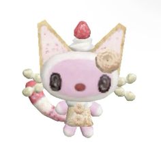 a pink and white cat figurine with a strawberry on it's head