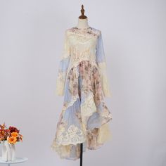 F00282574-104 Spring A-line Midi Dress With Lace Trim, Beige A-line Long Sleeve Dress For Spring, Bohemian A-line Midi Dress For Garden Party, Feminine Long Sleeve Midi Dress With Lace Patchwork, Beige Long Sleeve Lace Midi Dress, Cream Lace Long Sleeve Midi Dress, Summer A-line Dress With Lace Patchwork, Feminine Blue Dress With Lace Patchwork, Beige Patchwork Dress For Party