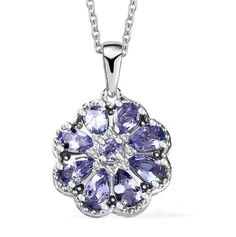 Natural Tanzanite and White Moissanite Daisy Floral Pendant Necklace in Over Sterling Silver , Genuine Tanzanite Blue Stone Crystal Pendant Tanzanite I Information :- Number of Pear Tanzanite (s)  :  8 Minimum Carat Weight (ct. tw)  :  1.67 Minimum Size  :  5x3 mm Gemstone Color  :  Violet Blue Average Clarity  : Transparent Hardness  :  6.5-7 Treatment  :  Heat Setting Type  :  Prong Tanzanite II Information :- Number of Round Tanzanite (s)  :  1 Minimum Carat Weight (ct. tw)  :  0.12 Minimum S Blue Pendant Jewelry, Bridal Pendant, Floral Pendant Necklace, 20 Inch Necklace, Color Violet, Tanzanite Stone, Bleu Violet, Blue Pendant, Floral Pendant