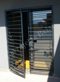 an open door with metal bars on it