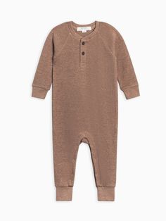 The Crosby Waffle Knit Henley Romper is the perfect cozy one-piece for all your winter adventures. You and your baby are bound to love its soft and stretchy waffle knit fabric with the adorable elastic ribbed cuffs and neckline for stretch. Made of 100% Organic Cotton Waffle Knit fabric Leg and gusset snaps for easy changing Water-based dyes ensuring long-lasting color vibrancy and durability Sustainably sourced and ethically produced Machine Wash Cold, Tumble Dry Low Fall Waffle Knit Henley For Loungewear, Cotton Waffle Knit Henley With Crew Neck, Fall Waffle Knit Henley, Mens Waffle Henley, Offline By Aerie Wow! Waffle Henley T-shirt, Waffle Henley, Knitted Romper, Winter Adventure, Organic Cotton Baby