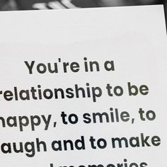 a close up of a piece of paper with a quote on it that says, you're in a relationship to be happy, to smile, to laugh, to make impersonies