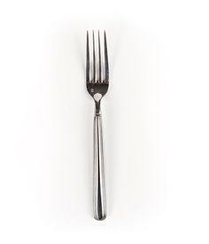 a fork is shown on a white surface