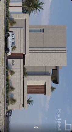 an aerial view of a house with cars parked in the driveway and palm trees on either side