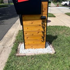 a mailbox sitting on the side of a road