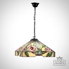 The name Tiffany is synonymous with products featuring stained and art glass pieces, copper foiled together, and particularly light fittings that benefit the beauty that the electric light bulb does to these when lit. SHOP NOW Tiffany Lamps, Dimmable Lamp, Tiffany Style, Pretty Colours, Led Lamp, Stained Glass, Pendant Light