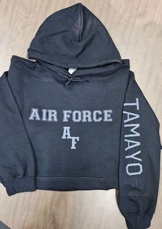 Air Force Black Unisex Hoodie  .:8 oz., 50% cotton, 50% polyester .:1x1 ribbed cuffs and waistband with spandex .:Matching drawcord .:Pouch pocket All items are printed on demand, so please be sure to check your size.  Size chart is listed with each item.  To maintain your shirts customer design, we do recommend washing your garments inside out on the gentle cycle with cold or lukewarm water. You can either tumble dry low or line dry.  Thank you supporting this small business! Feel free to conta Air Force Black, Military Hoodie, Pocket Pouch, Unisex Hoodies, Air Force, Print On Demand, Inside Out, Gender Neutral, Force