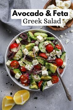 a salad with cucumbers, tomatoes, feta cheese and olives in a bowl