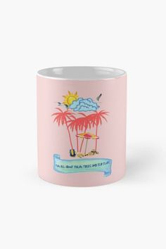 a pink coffee mug with an image of a palm tree