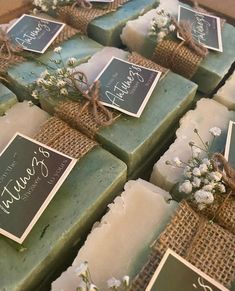 soaps with labels and flowers on them