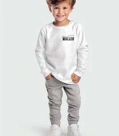 Morgan Wallen-inspired toddler longsleeve - Get your hands on the hottest shirts of the season with our collection inspired by the country singer. This Morgan Wallen Custom Made longsleeve is the perfect garment for young fans of this talented country music artist. Designed to bring the best to the youngest of us all, the custom toddler long-sleeve tee is made from 100% combed ringspun cotton fine jersey. Built to last, the garment features a topstitched ribbed collar and shoulder-to-shoulder self-fabric back-neck taping. These inclusions boost durability, fit, and comfort. The label is EasyTear™, a nice feature for those with sensitive skin.  .: 100% combed, ring-spun cotton (fiber content may vary for different colors) .: Light fabric (4.5 oz/yd² (153 g/m .: Toddler unisex fit .: Tear aw Wallen Shirt, Country Singer, Morgan Wallen, Country Music Artists, Music Tees, Music Artist, Country Singers, Toddler Tees, Country Music