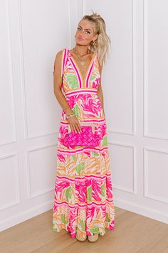 - Every Bahama bound babe needs this vibrant maxi! - Fully lined chiffon material with an abstract floral print featuring orange, green, and pink hues - A semi-sheer lining - A v-cut neckline and back - 2-inch tie closure straps - A cinched waistline with a stretchy smocked back - A flowy silhouette that ends in a maxi length hemline Concert Fashion, Long Sweater Dress, Abstract Floral Print, Swimwear Dress, Chiffon Material, Sparkly Dress, Black Dresses Casual, Little White Dresses, Green And Pink