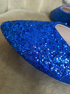 Color: Cobalt blue glitter As shown. Other Style: This is for the purchase of an pointed toe. A rounded toe can be purchased. At checkout leave a buyers note indicating the change. Shipping: Please refer to our current shipping times in the shipping section. Review prior to purchasing. If you need your item sooner then the listed time please let us know so we can confirm the availability of a rush order spot. Glitter Party Flats With Round Toe, Glitter Flats With Round Toe For Party, Glitter Round Toe Flats For Party, Blue Closed Toe Flats For Party, Blue Pointed Toe Ballet Flats, Bride Flats, Glitter Ballet Flats, Glitter Flats, Blue Glitter